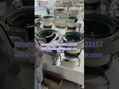 Two Vibratory Bowl Feeders Convey Parts together